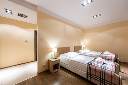 Hotel Dobre z Lasuにあるベッド