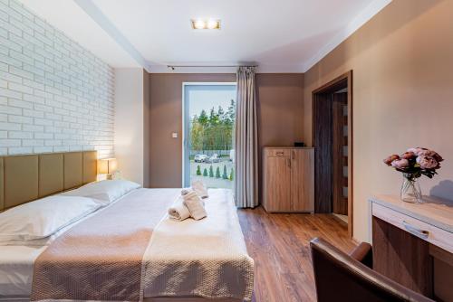 Hotel Dobre z Lasuにあるベッド