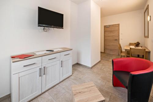 TV a/nebo společenská místnost v ubytování Appartement Sarah