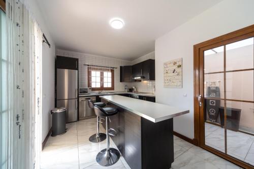 Kuchyň nebo kuchyňský kout v ubytování Tilley. Private Villa