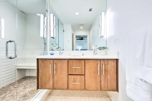 a bathroom with a sink and a shower at Mid-Century Dream Home Less Than Half-Mile to Beach! in Ocean Springs