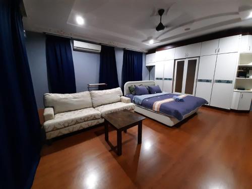 Χώρος καθιστικού στο Homestay Banglo Alor Setar