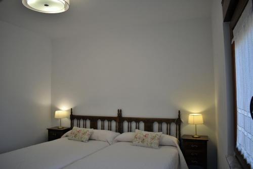 Posteľ alebo postele v izbe v ubytovaní Apartamentos Picea Azul