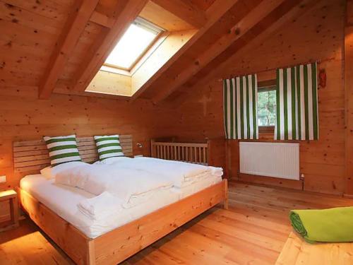 A bed or beds in a room at aeki TYROL