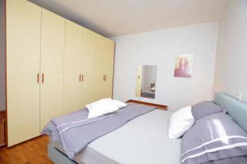 Postel nebo postele na pokoji v ubytování Apartment Gasparini