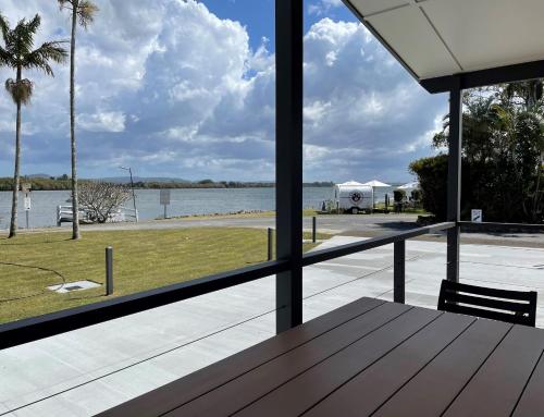 a view of the water from the porch of a house at Fishing Haven Holiday Park in Palmers Island