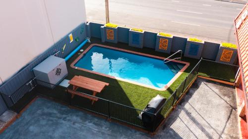 an overhead view of a swimming pool on a building at Midlands Motel in Taree