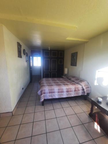 Ein Bett oder Betten in einem Zimmer der Unterkunft La Terraza