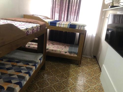 Una cama o camas cuchetas en una habitación  de !Penha casa toda mobiliada para temporada