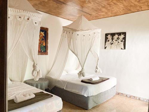 Posezení v ubytování Taman Ayu Homestay Munduk Mitra RedDoorz