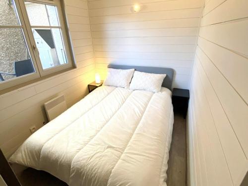 Katil atau katil-katil dalam bilik di Appartement Mont-de-Lans, 3 pièces, 6 personnes - FR-1-516-167
