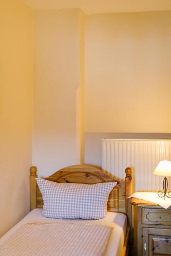 Postel nebo postele na pokoji v ubytování Hotel Vogtareuther-Hof