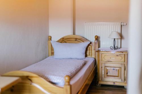 Postel nebo postele na pokoji v ubytování Hotel Vogtareuther-Hof