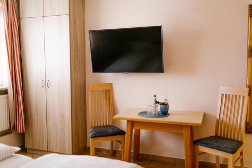TV a/nebo společenská místnost v ubytování Hotel Vogtareuther-Hof