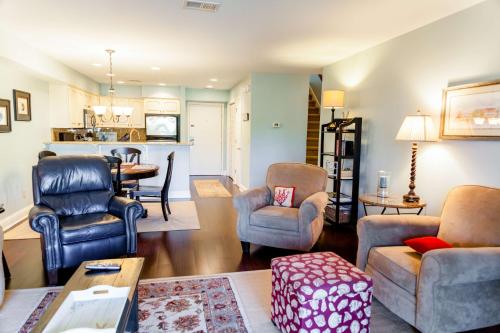 a living room with chairs and a table at Wild Dunes Resort - Vacation Rentals in Isle of Palms