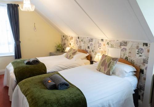 Krevet ili kreveti u jedinici u okviru objekta Beecroft Lodge