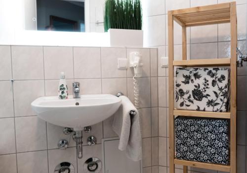Kylpyhuone majoituspaikassa Sehnsucht Rügen Ferienappartements