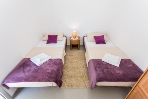Posteľ alebo postele v izbe v ubytovaní Apartment Mojaš