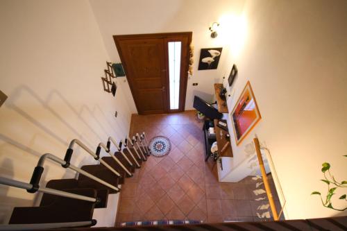 a view of a stairway with a spiral staircase at Piccola casetta toscana in Pisa