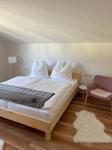 Ένα ή περισσότερα κρεβάτια σε δωμάτιο στο Naturpark Appartment