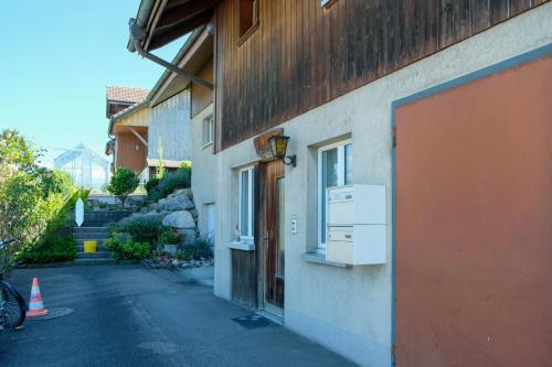 a building with a air conditioner on the side of it at Hauswurz in Thun