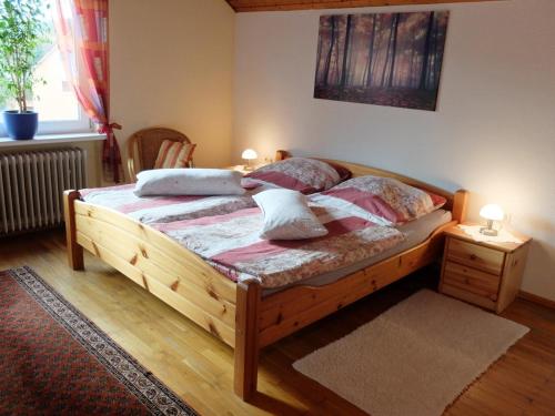 Postel nebo postele na pokoji v ubytování Schöne Aussicht