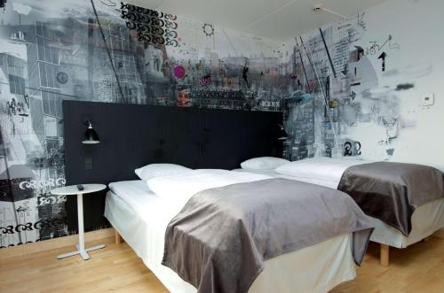 
A bed or beds in a room at Scandic Copenhagen
