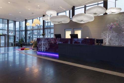 a lobby of a building with a waiting room at Scandic Narvik in Narvik