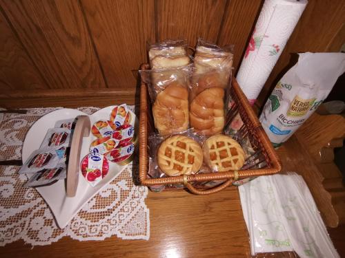 a basket of waffles and cookies on a table at Il Torrione in Poggio Bustone