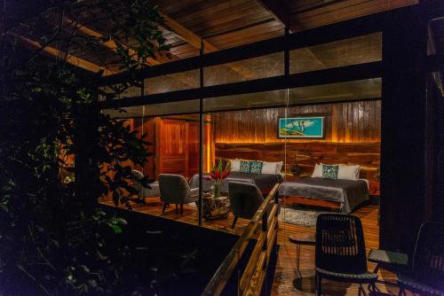 a living room with a couch and chairs at Ecolirios Boutique Hotel and Spa in Guácimo