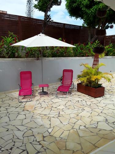 Zahrada ubytování Appartement cosy à Sainte Rose / 50 m² / Piscine partagée