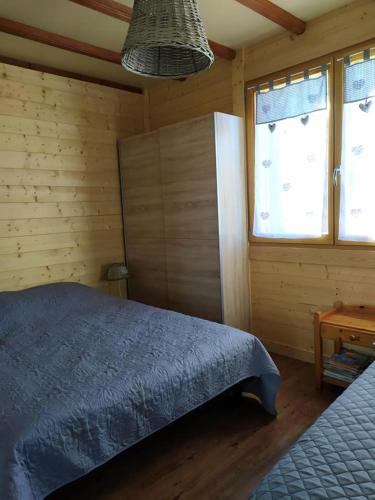 Postel nebo postele na pokoji v ubytování Chalet du Spièmont
