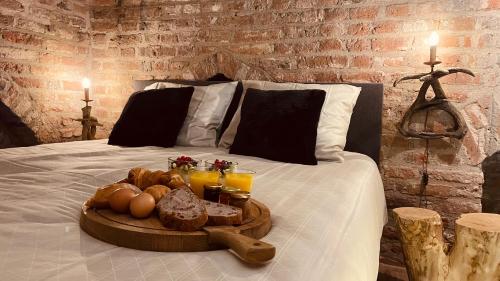 Postel nebo postele na pokoji v ubytování Walburgis Residenties