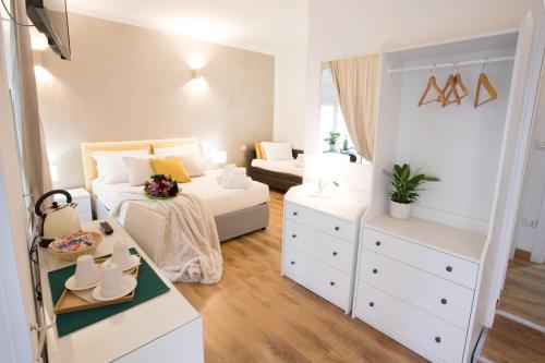 Cama o camas de una habitación en Chroma Italy - Chroma Octho