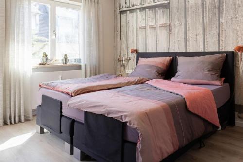 Säng eller sängar i ett rum på City-Appartment schick, Einzelgarage inkl