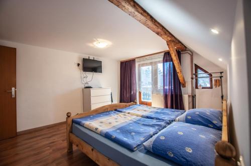 A bed or beds in a room at Hostel, Rooms and Apartment Ceklin