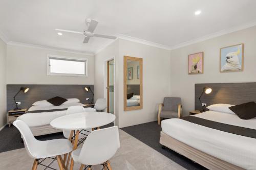 Wingham Motelにあるベッド