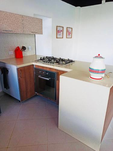 Una cocina o cocineta en El Espume de San Juan by JR