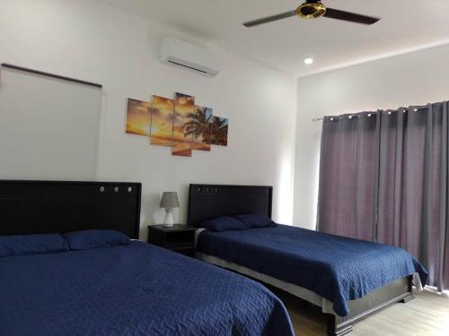 Postel nebo postele na pokoji v ubytování Casa Coral Tamarindo