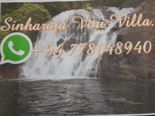a picture of a waterfall with the name of the waterfall at Sinharaja Vini Villa in Deniyaya