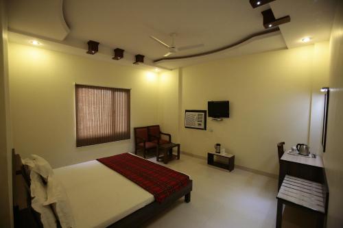 Sarovar Regency 객실 침대