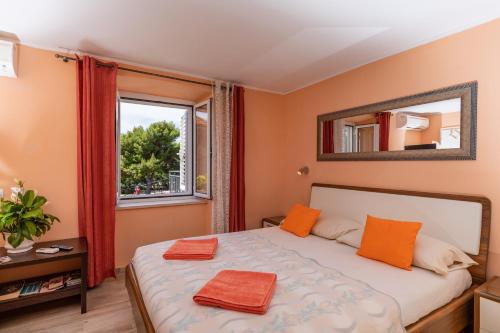 Postel nebo postele na pokoji v ubytování Rooms Edna
