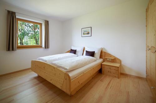 Posteľ alebo postele v izbe v ubytovaní Schartnerhof Ferienwohnung Lavendel