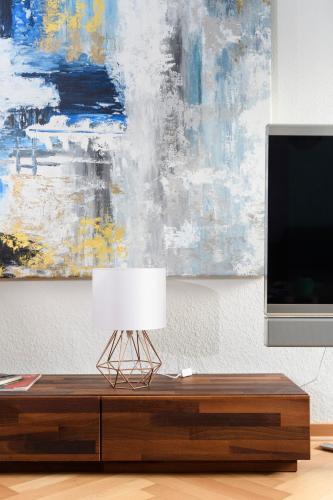 a living room with a tv and a table with a lamp at Schönste Location in Würzburg in Würzburg
