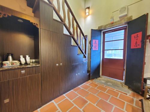Una cocina o cocineta en 歇會兒民宿典藏館