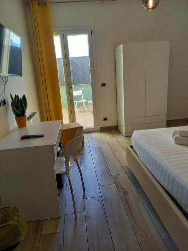 Postel nebo postele na pokoji v ubytování Giosam Bed & Breakfast di Raimondo Isabelle