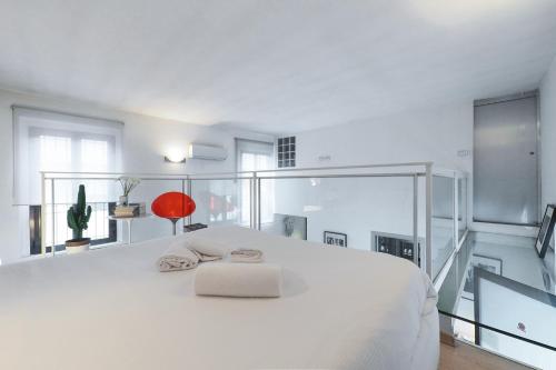 Postel nebo postele na pokoji v ubytování PrimoPiano - XXII Marzo