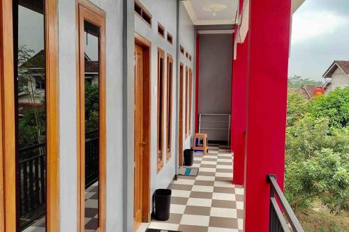Балкон или терраса в Homestay Griya Sawah Gunung Syariah Mitra RedDoorz
