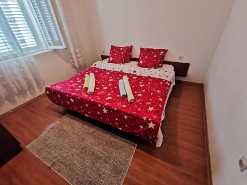 Postel nebo postele na pokoji v ubytování Apartman Juraga