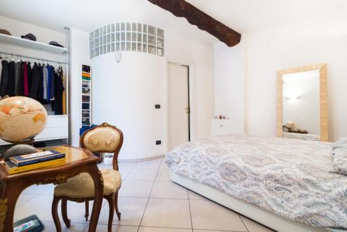 Säng eller sängar i ett rum på Appartamento comodo nei pressi dell'Archiginnasio by Wonderful Italy
